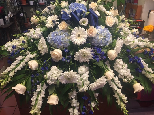 WHITE & BLUE CASKET SPRAY from Redwood Florist in New Brunswick, NJ