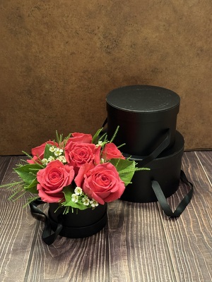 HOT PINK ROSES ARRANGED IN HAT BOX from Redwood Florist in New Brunswick, NJ